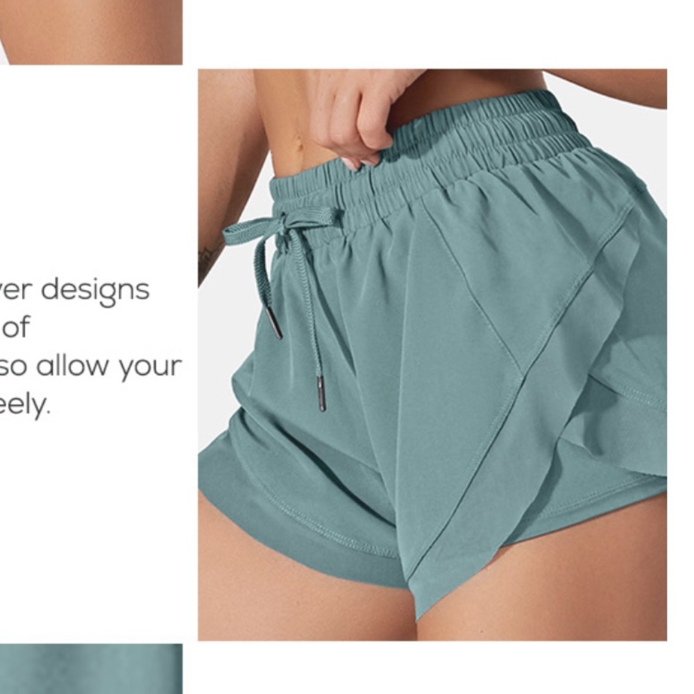 BNWT Halara workout shorts (teal)